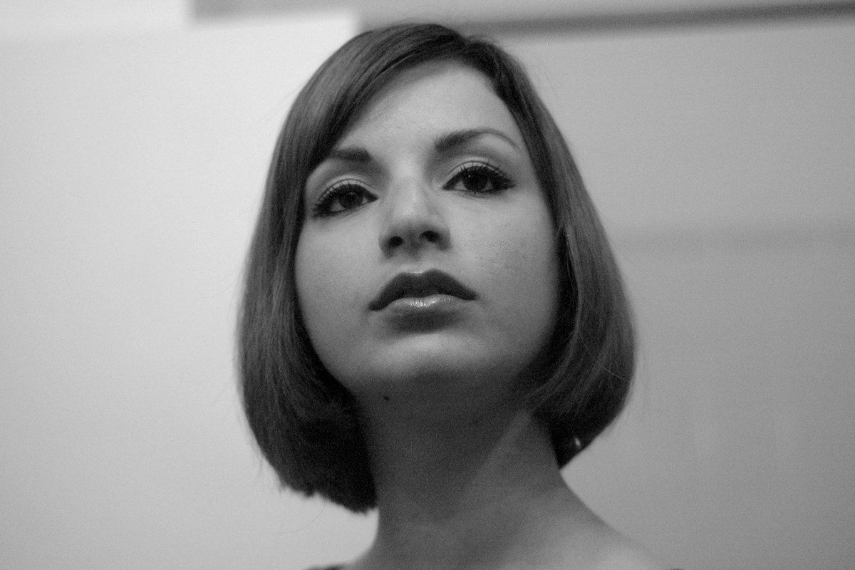 Woman with a sleek chin-length bob